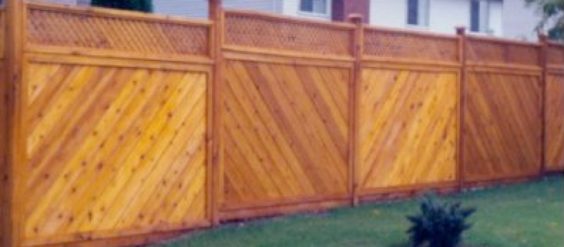 Backyard With Wooden Fence - idaho falls landscaping construction